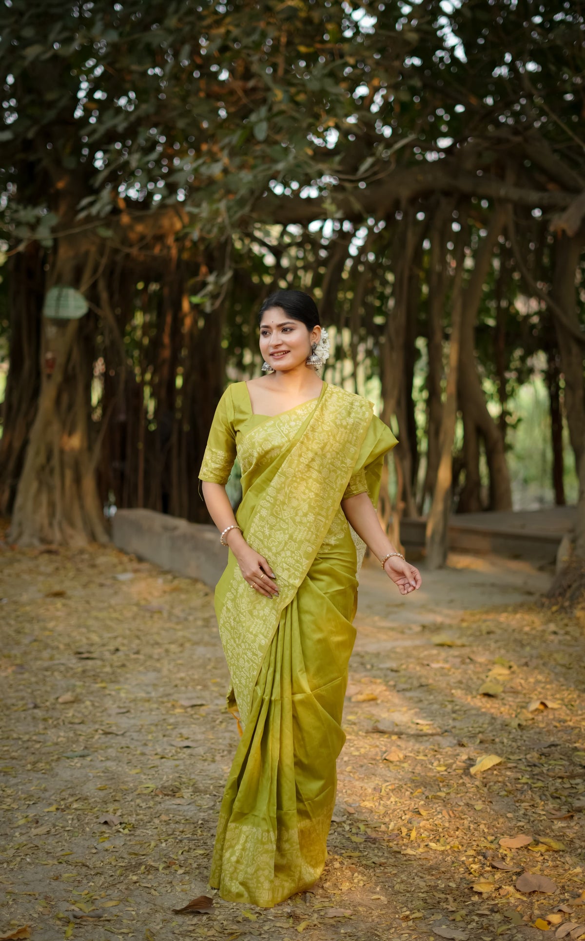 Green saree with Gala Border pattern outdoors