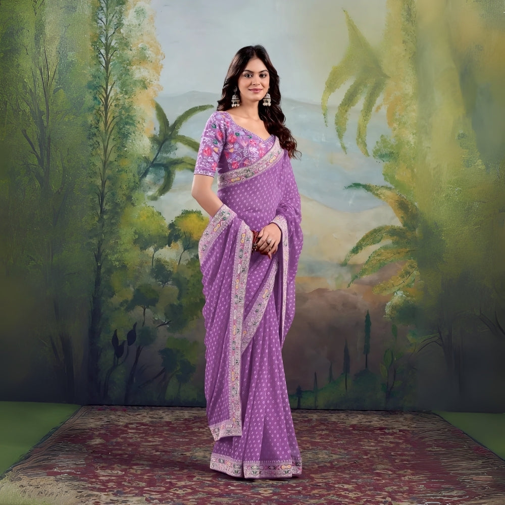 Woman wearing lavender saree with floral embroidered border and matching blouse in studio backdrop