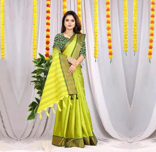 woman in lime green silk saree with rich zari border and matching green blouse for festive wear
