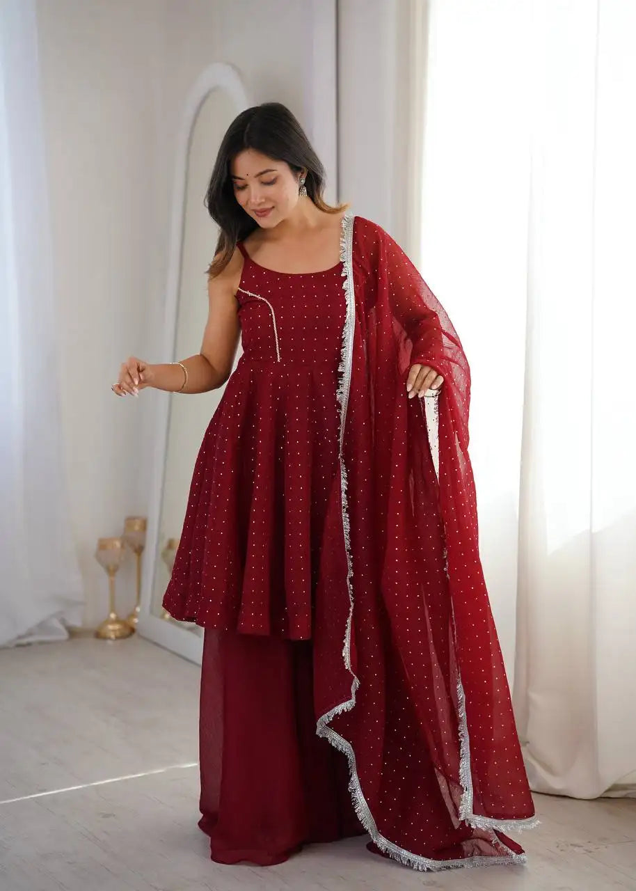 Maroon Jharkhand Work Suit Kalyanja KU257 model holding dupatta