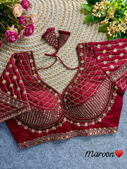 aroon blouse crafted from soft silk fabric, featuring intricate sequence and codding thread work.