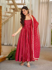 Maroon Anarkali Suit three quarter front model holding sheer dupatta with lace border