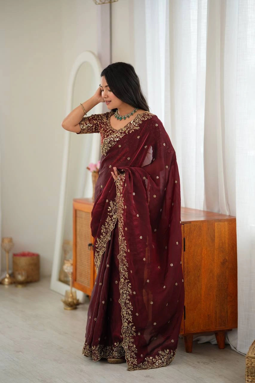 Maroon saree with thread work border and embroidered pallu