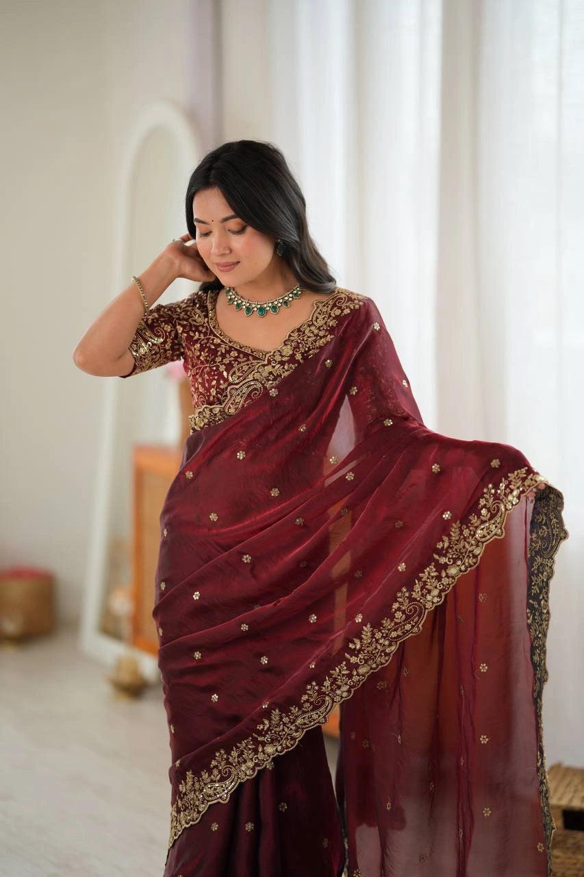 Maroon sequins saree on model with embroidered pallu