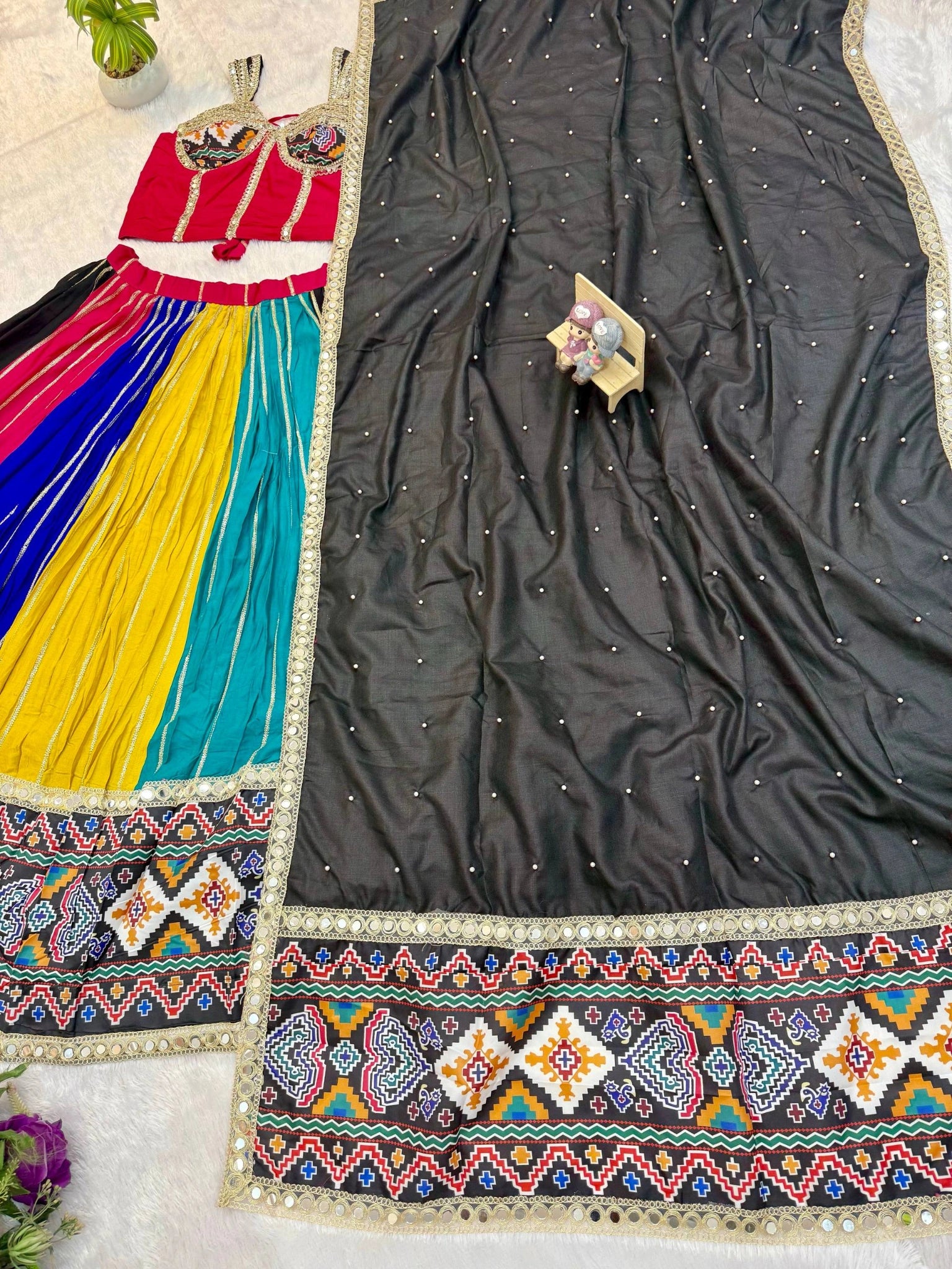Multicolor panelled lehenga and black dupatta flat lay – KL206