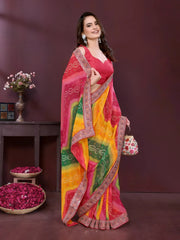 Woman wearing a colorful saree with a purple background
