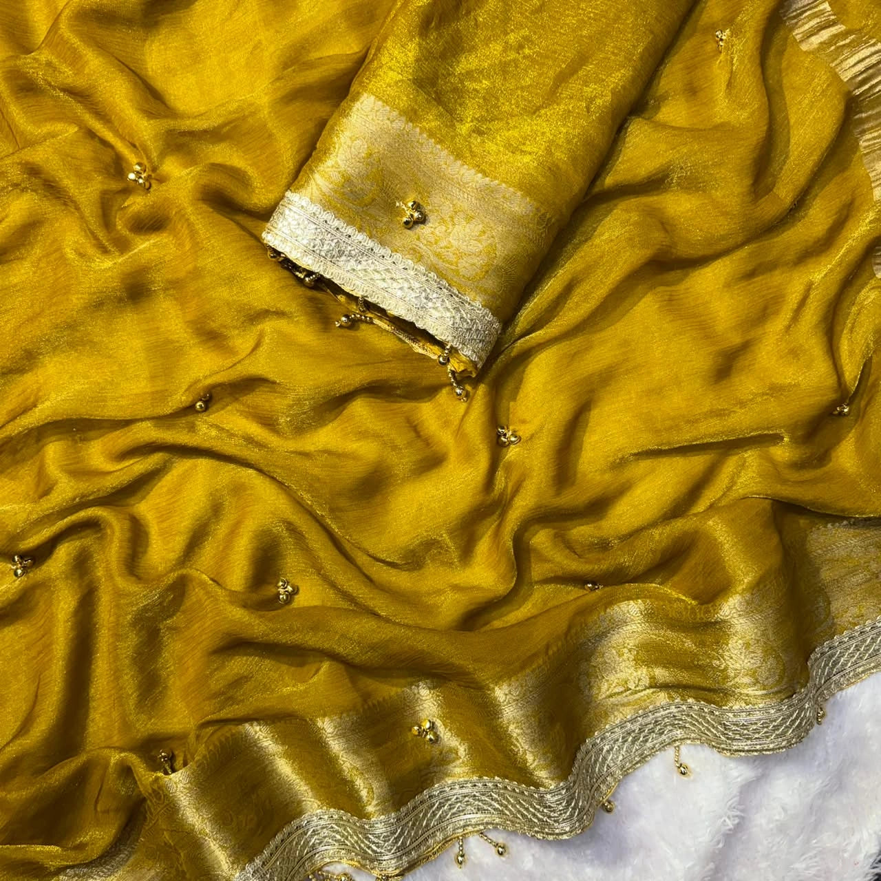 Mustard Yellow fendy chiffon saree with moti lace border and blouse piece