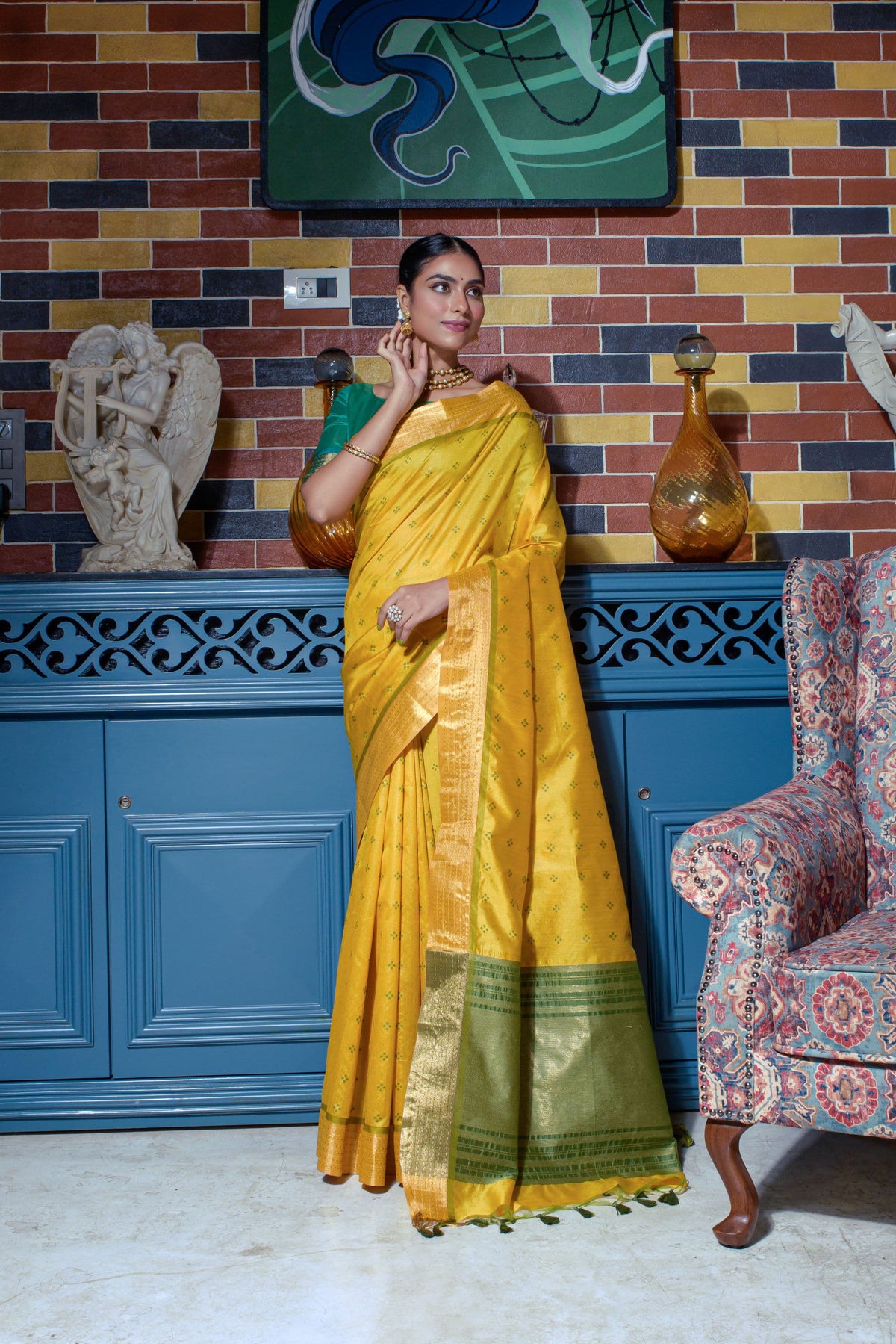 Mustard yellow saree with zari work and green border