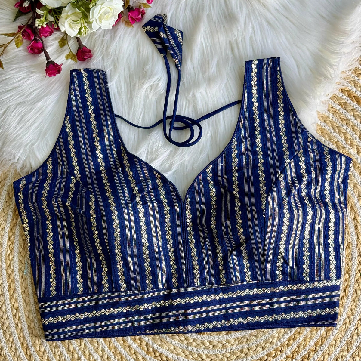 Elegant Navy Blue Zari Work Silk Blouse featuring intricate embroidery, perfect for festive and traditional occasions.