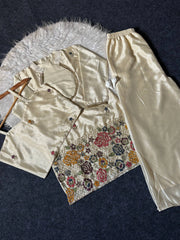 Off White Embroidered Beads and Kardana Work Suit flat lay on hanger