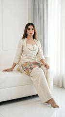 Off White Embroidered Beads and Kardana Work Suit seated pose
