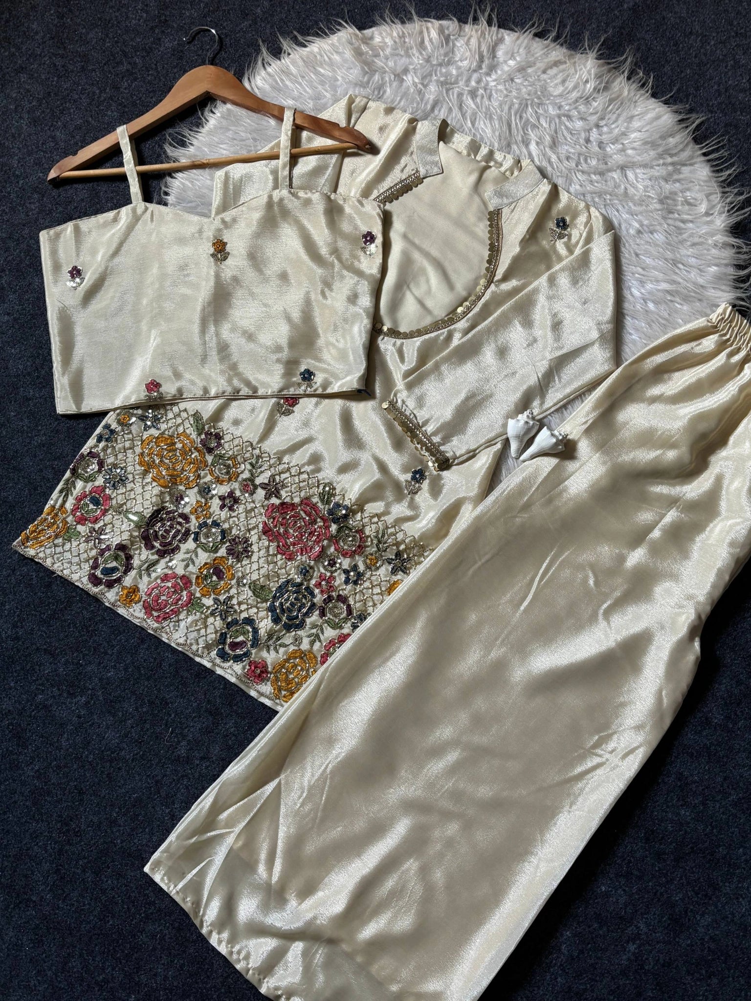 Off White shimmer chinon suit set flat lay with inner top and pant