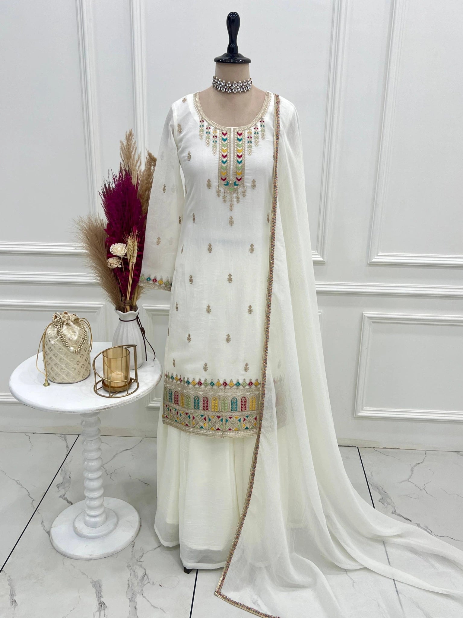 Off White Sequins Embroidered Suit with sharara and dupatta on mannequin