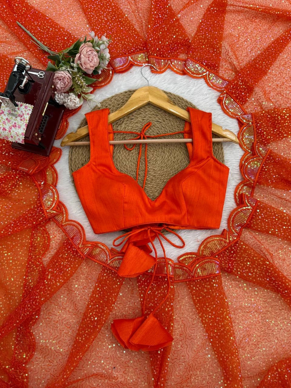 Orange sequins saree border and pallu – flat lay