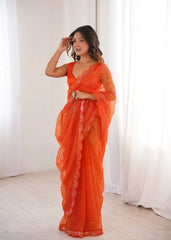 Orange sequins saree pallu drape on model