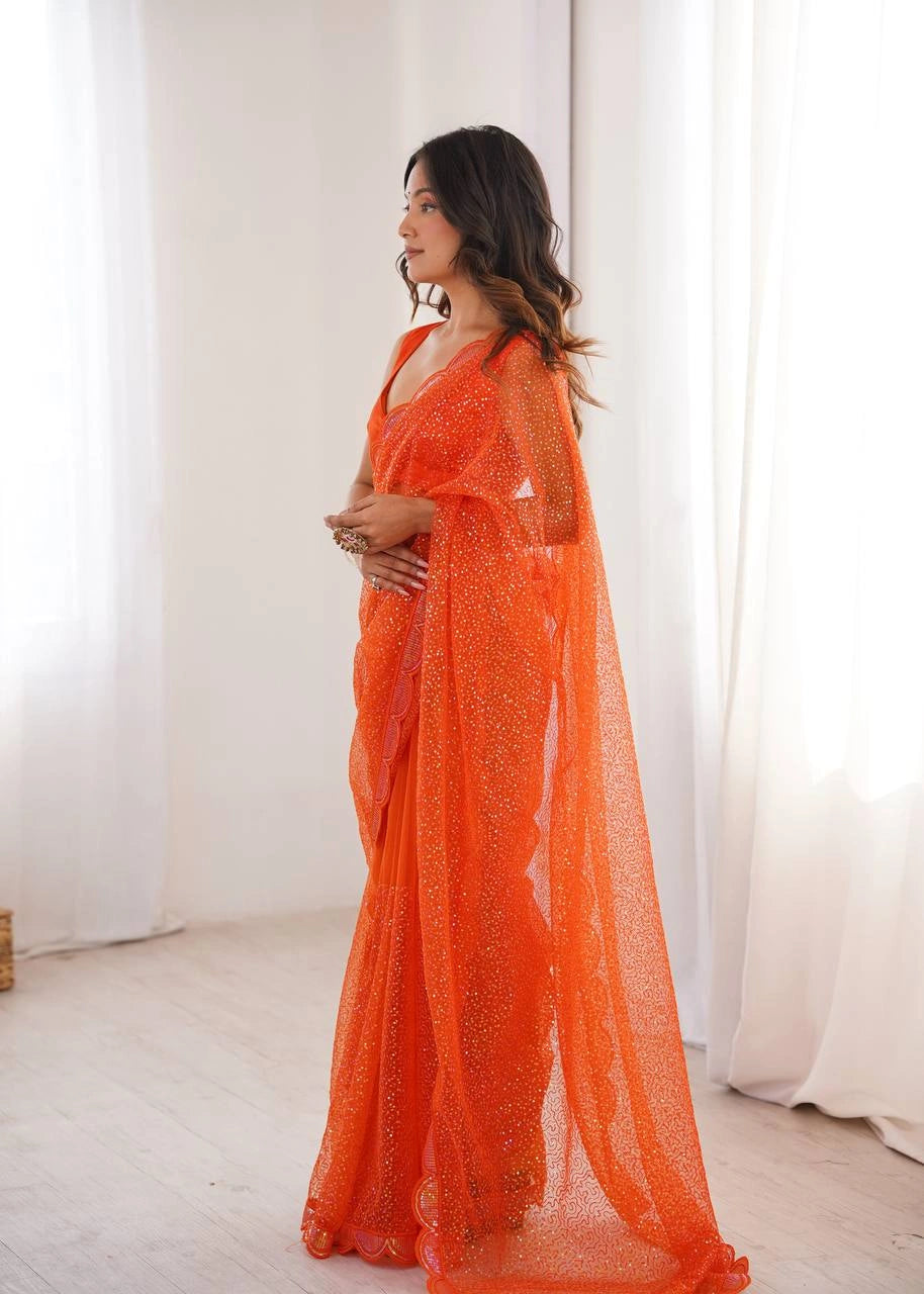 Orange embroidered net saree – full length model view