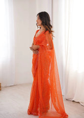 Orange embroidered net saree – full length model view
