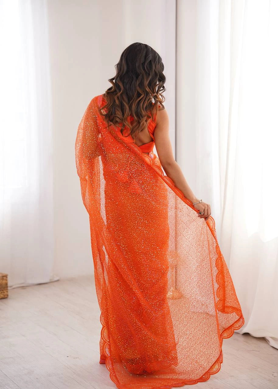 Orange sequins saree – back and pallu view on model