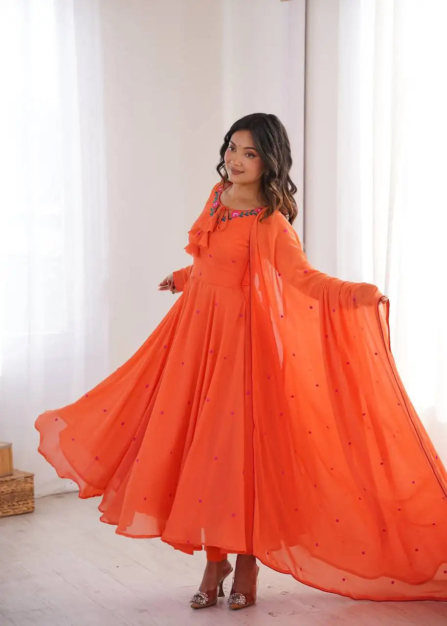 Orange Faux Georgette Suit KU204 model candid pose V-neck detail