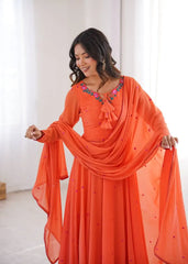 Orange Suit Kalyanja KU204 model holding dupatta floral booti