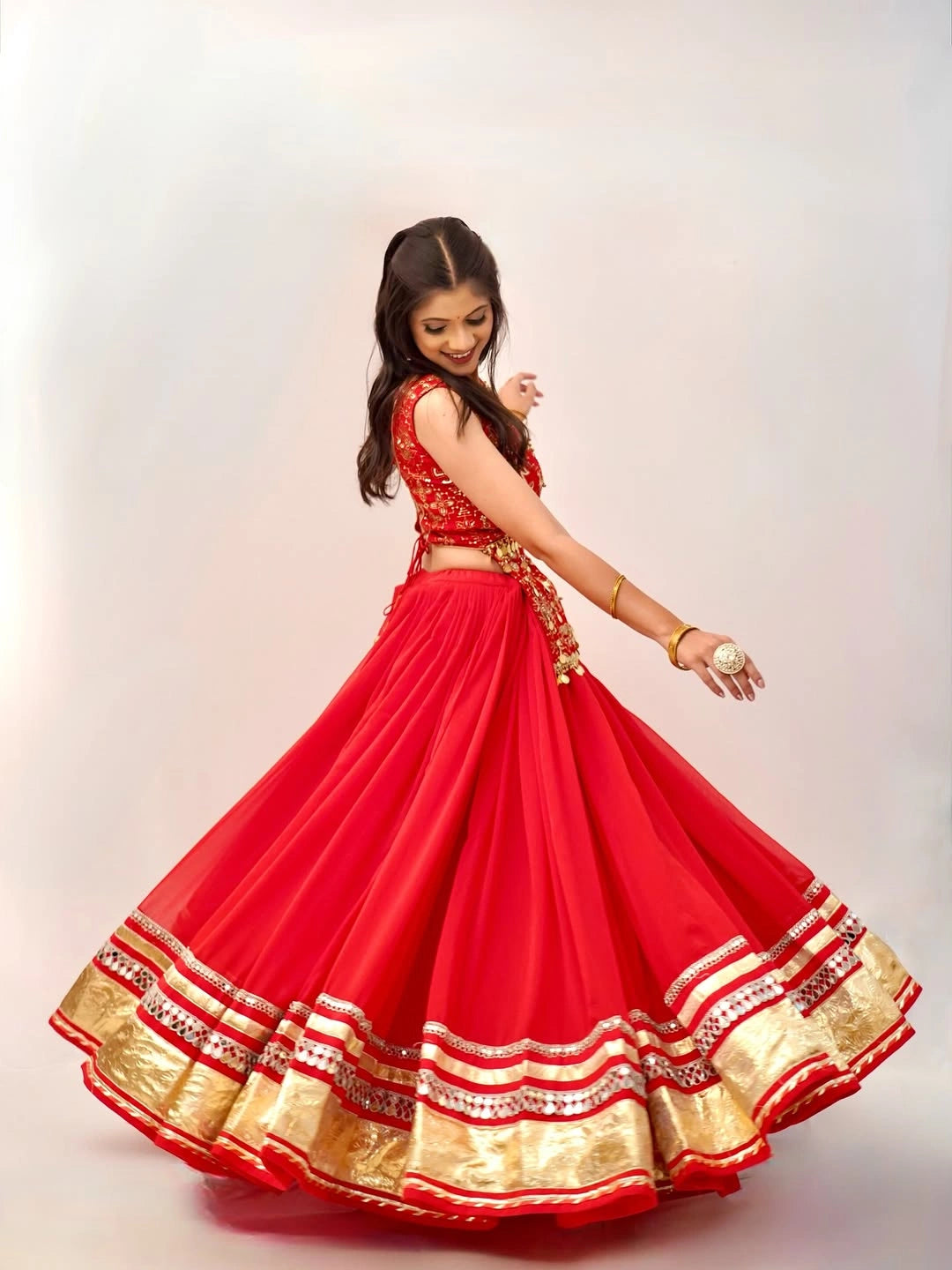 Orange Thread Embroidered Lehenga – twirling side view – KL185 – Kalyanja