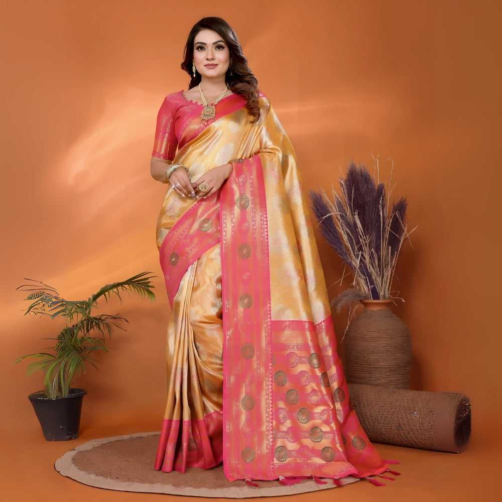Model wearing a yellow and pink Paithani woven saree with a contrast border and traditional woven motifs, paired with a matching blouse in an indoor studio product image, Indian ethnic wear