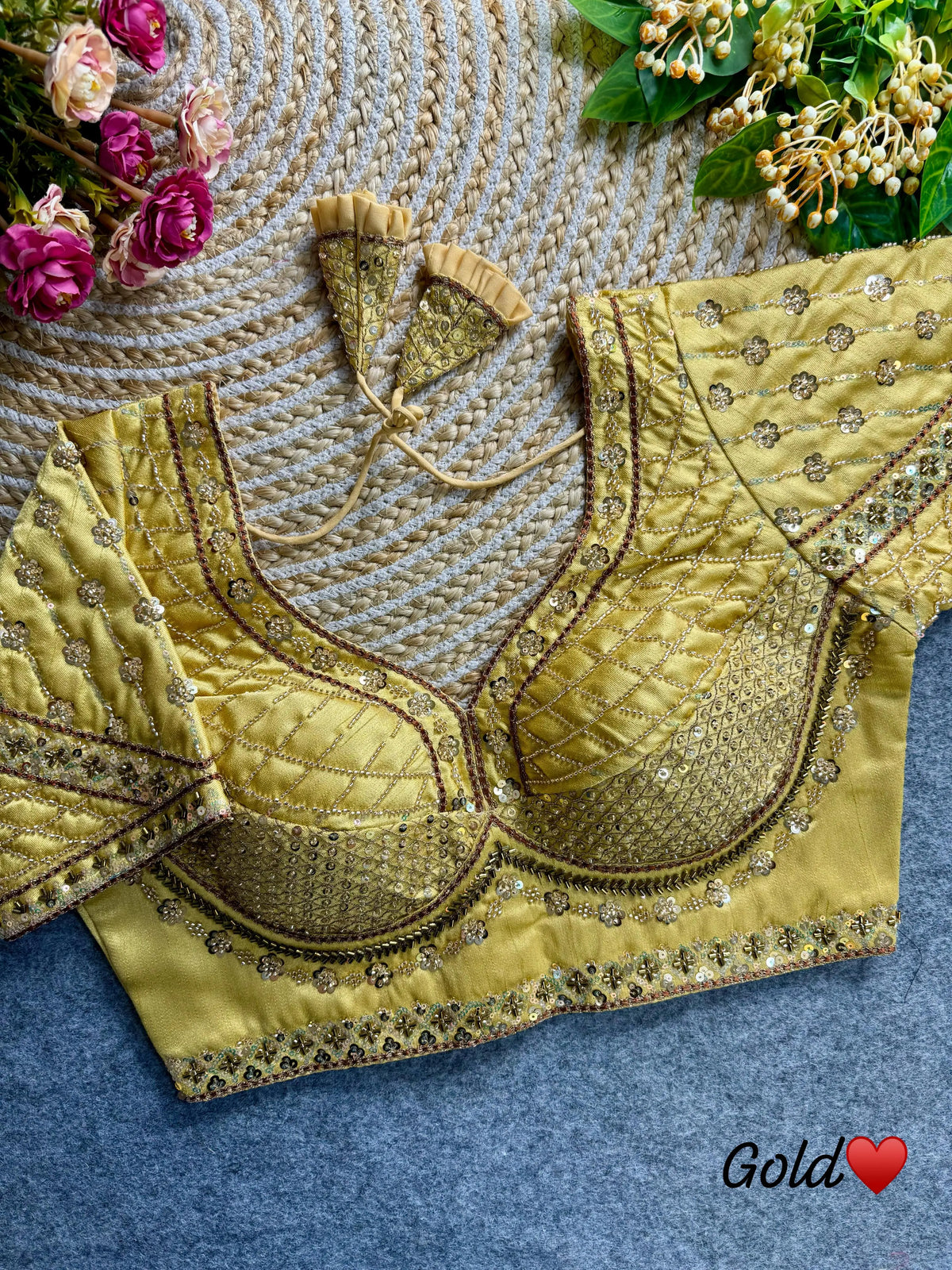Pale yellow blouse crafted from soft silk fabric, featuring delicate sequence and codding thread work.