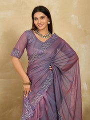 Lavender Swarovski Work Fendy Soft Net Saree showcasing elegant draping and intricate embroidery against a neutral background.