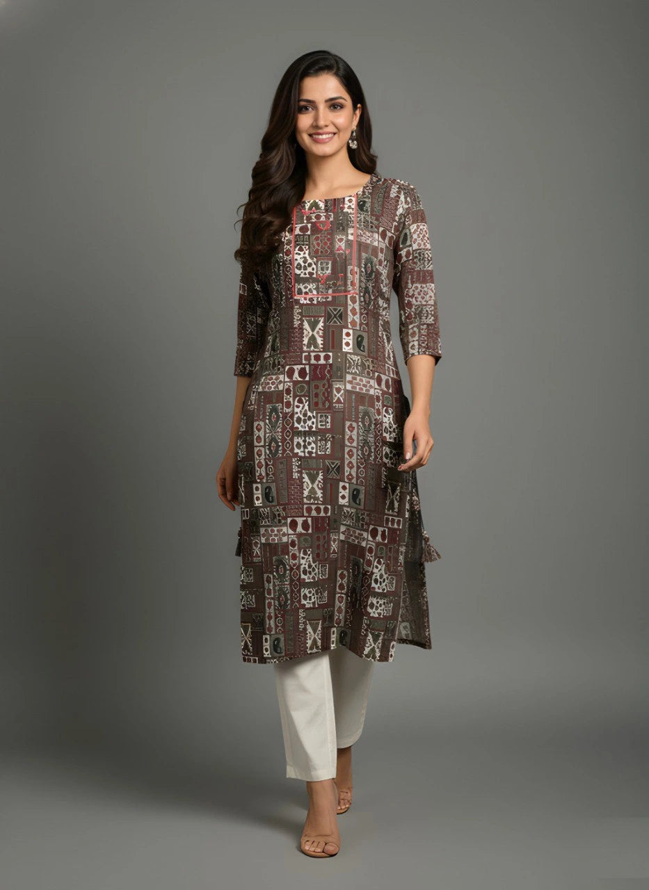 Woman wearing a patterned brown kurta with white pants on a gray background