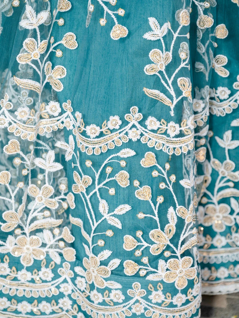 Teal Green Sequins Thread Embroidered Soft Net Lehenga