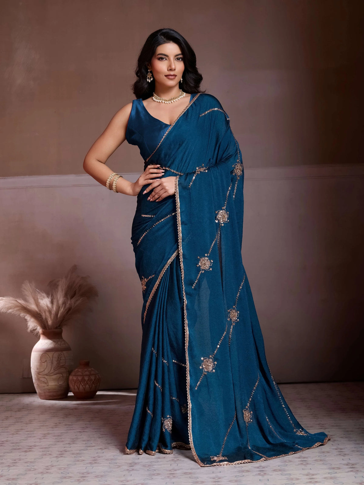 Gemini said
navy blue embroidered crush silk saree