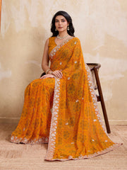 yellow georgette bandhej print saree
