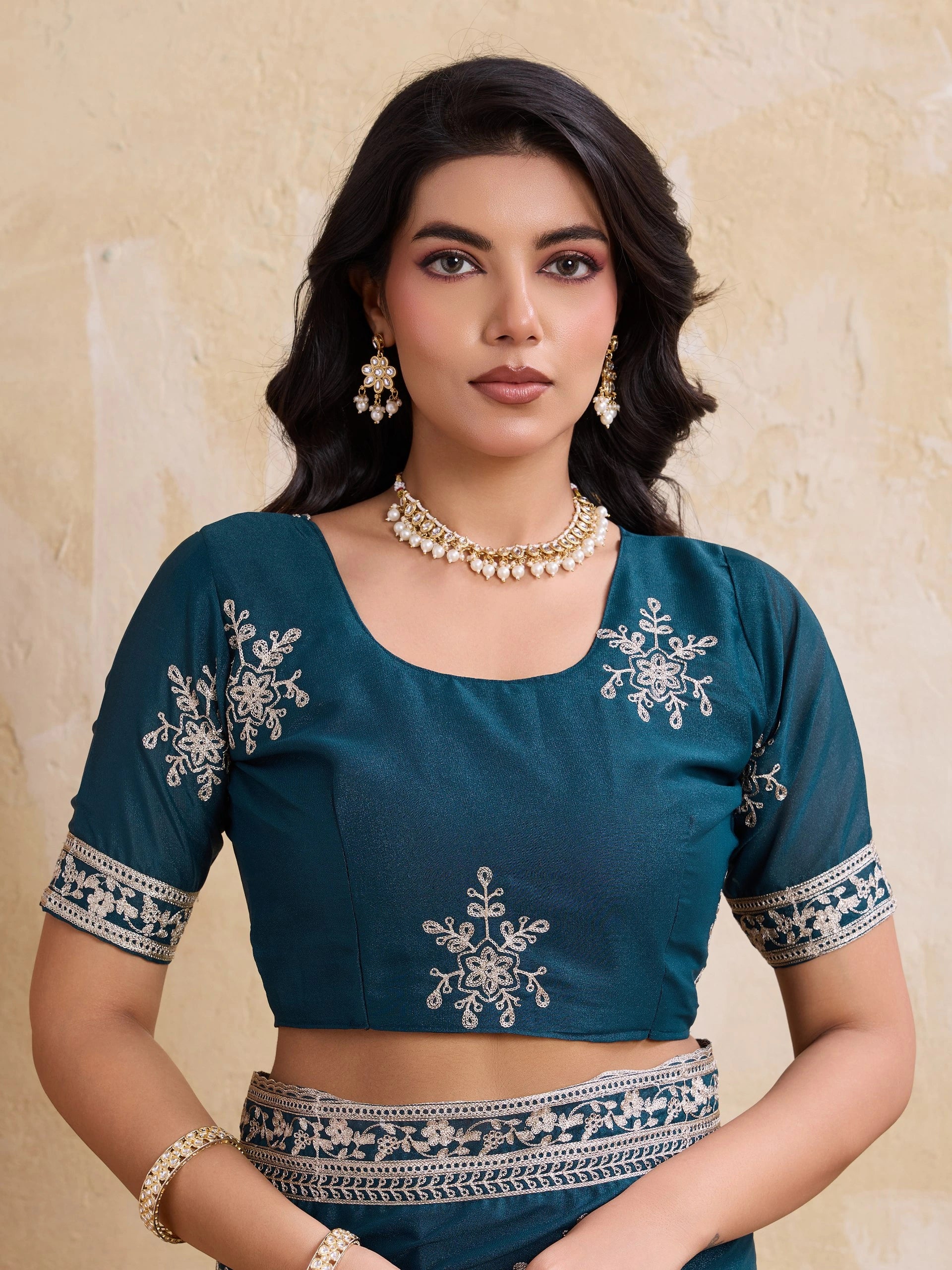 dark turquoise chainstitch embroidered star georgette saree