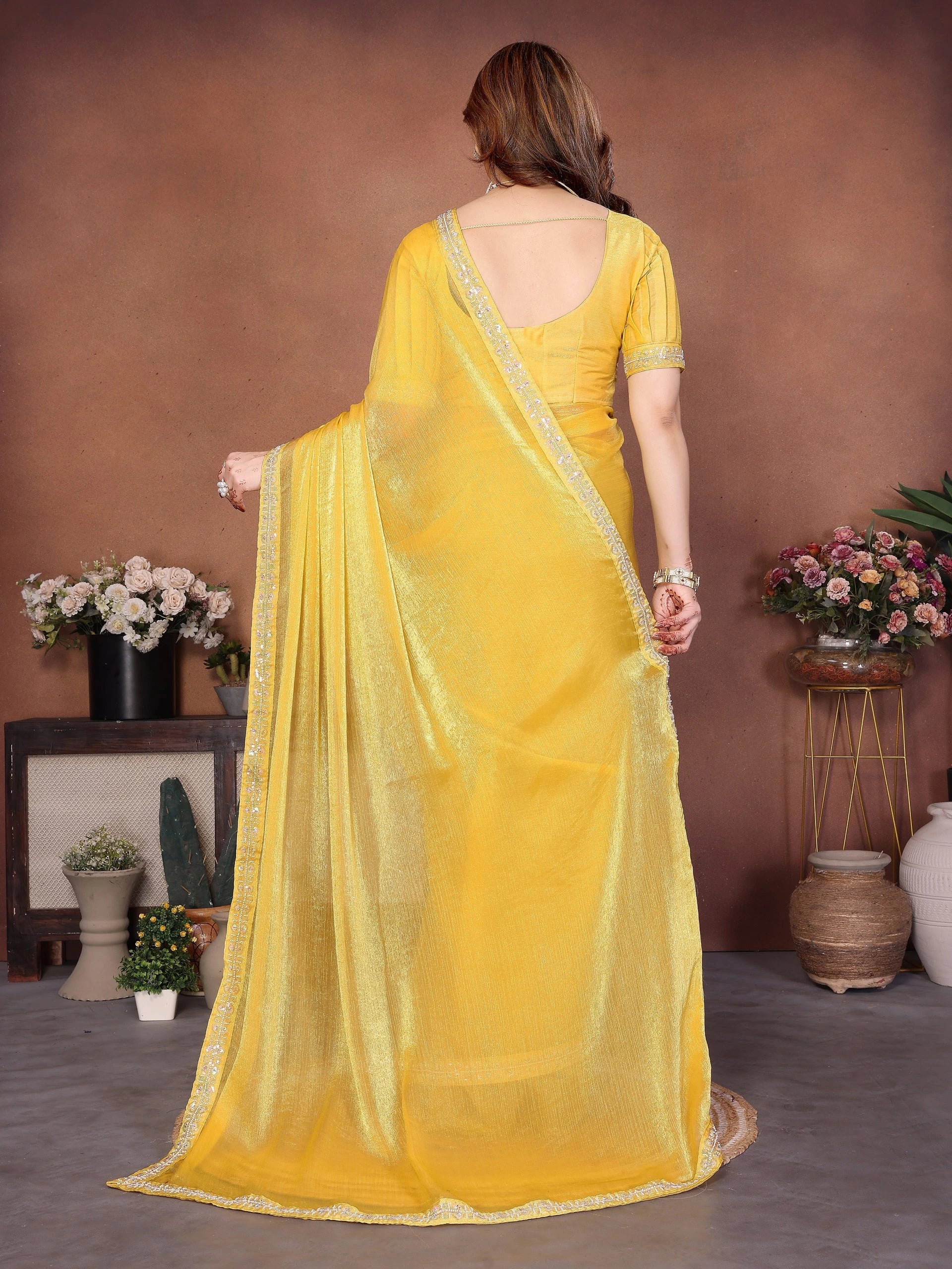 yellow embroidered fendy chiffon saree