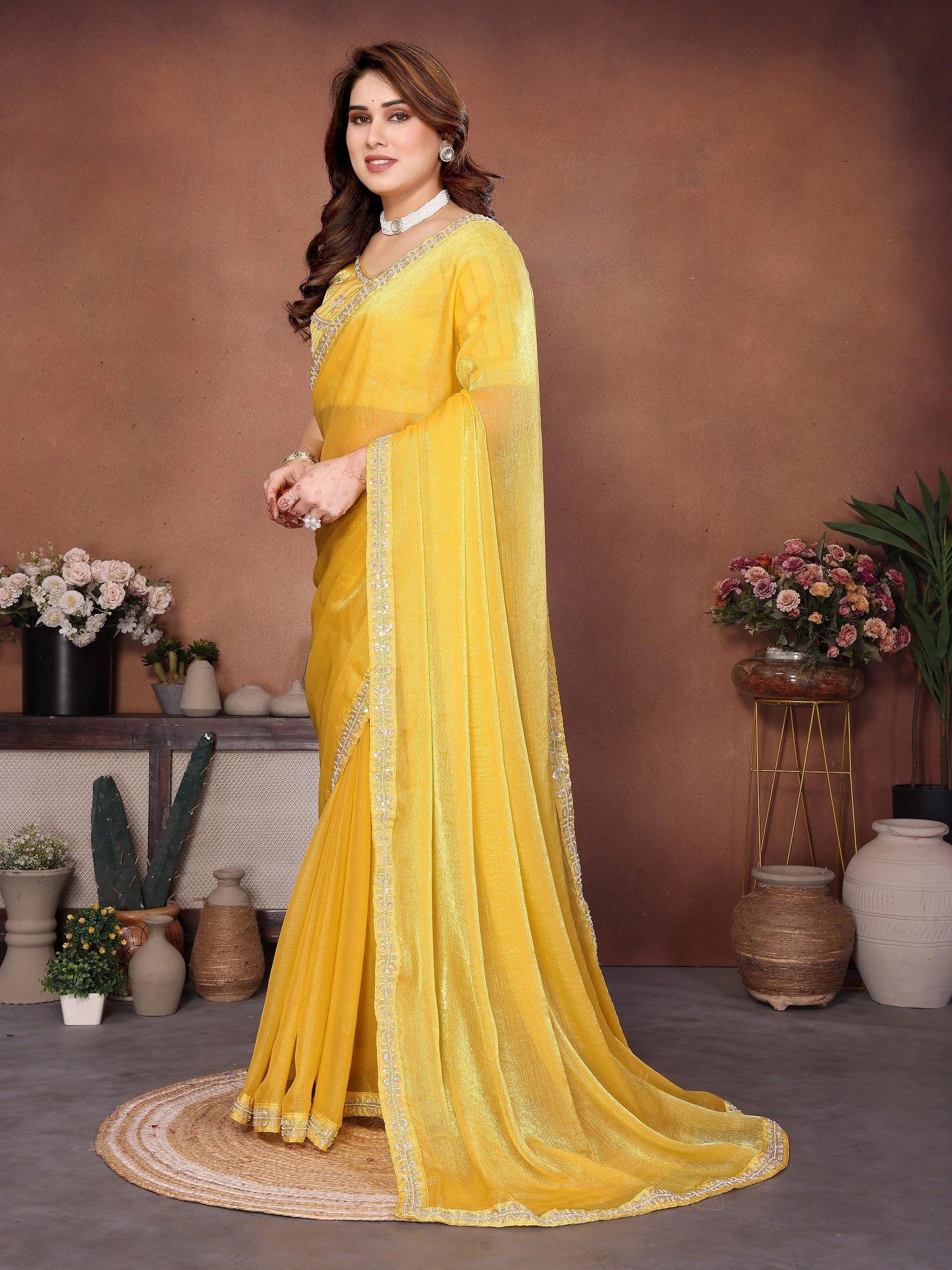 yellow embroidered fendy chiffon saree