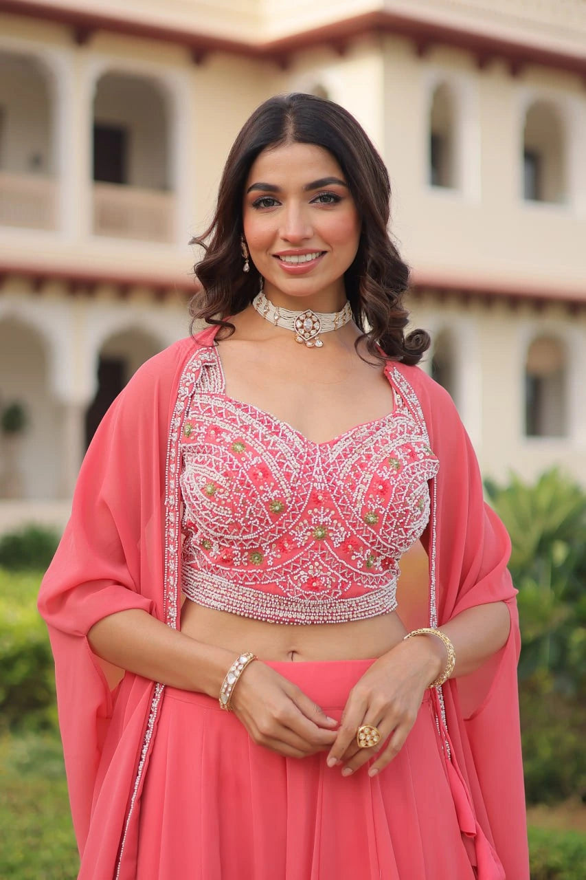 pink embroidered faux georgette lehenga