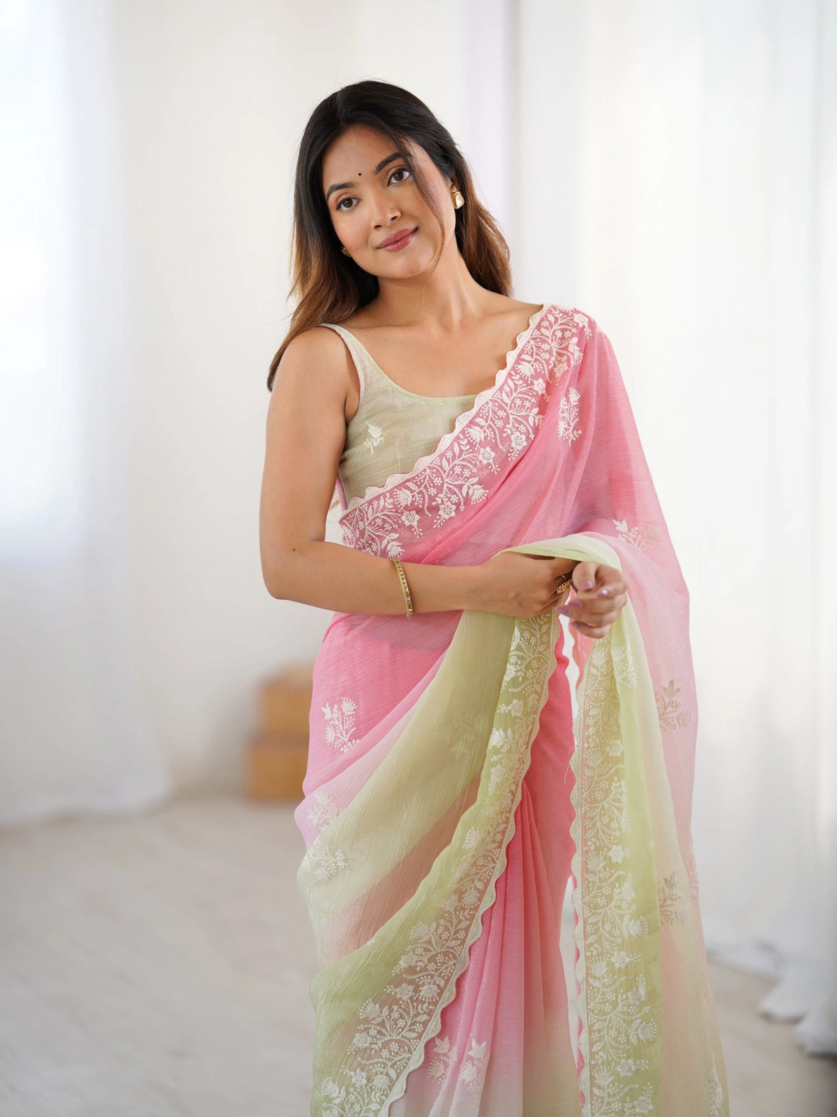 embroidered chiffon scalloped saree in a pink and light green
