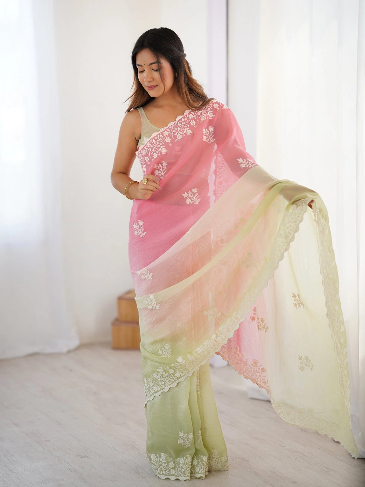 embroidered chiffon scalloped saree in a pink and light green
