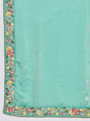 Turquoise fabric with floral embroidery along the edge