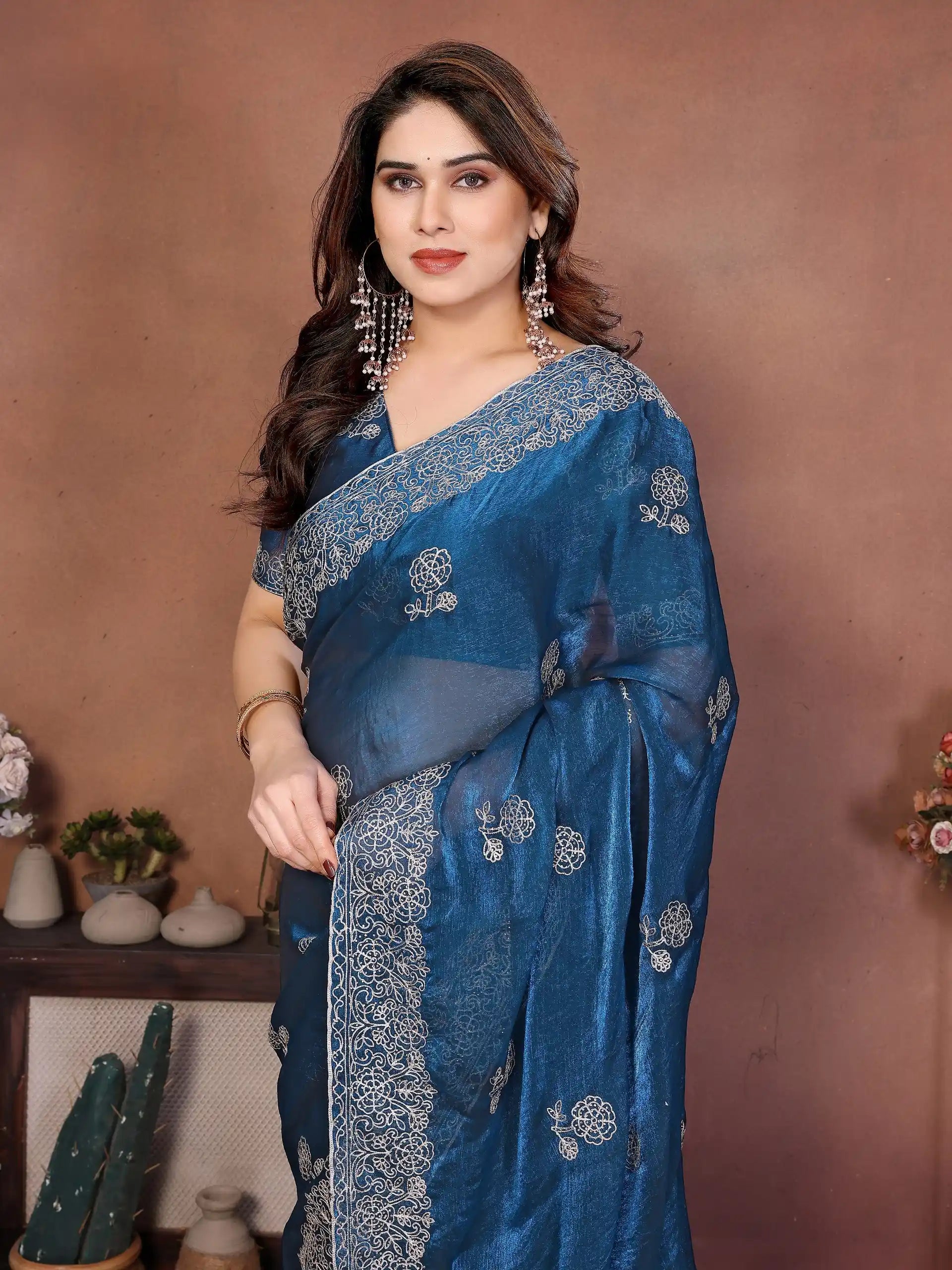 teal blue embroidered chiffon saree