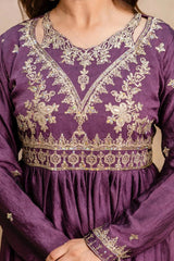 Purple dress with intricate gold embroidery on a neutral background