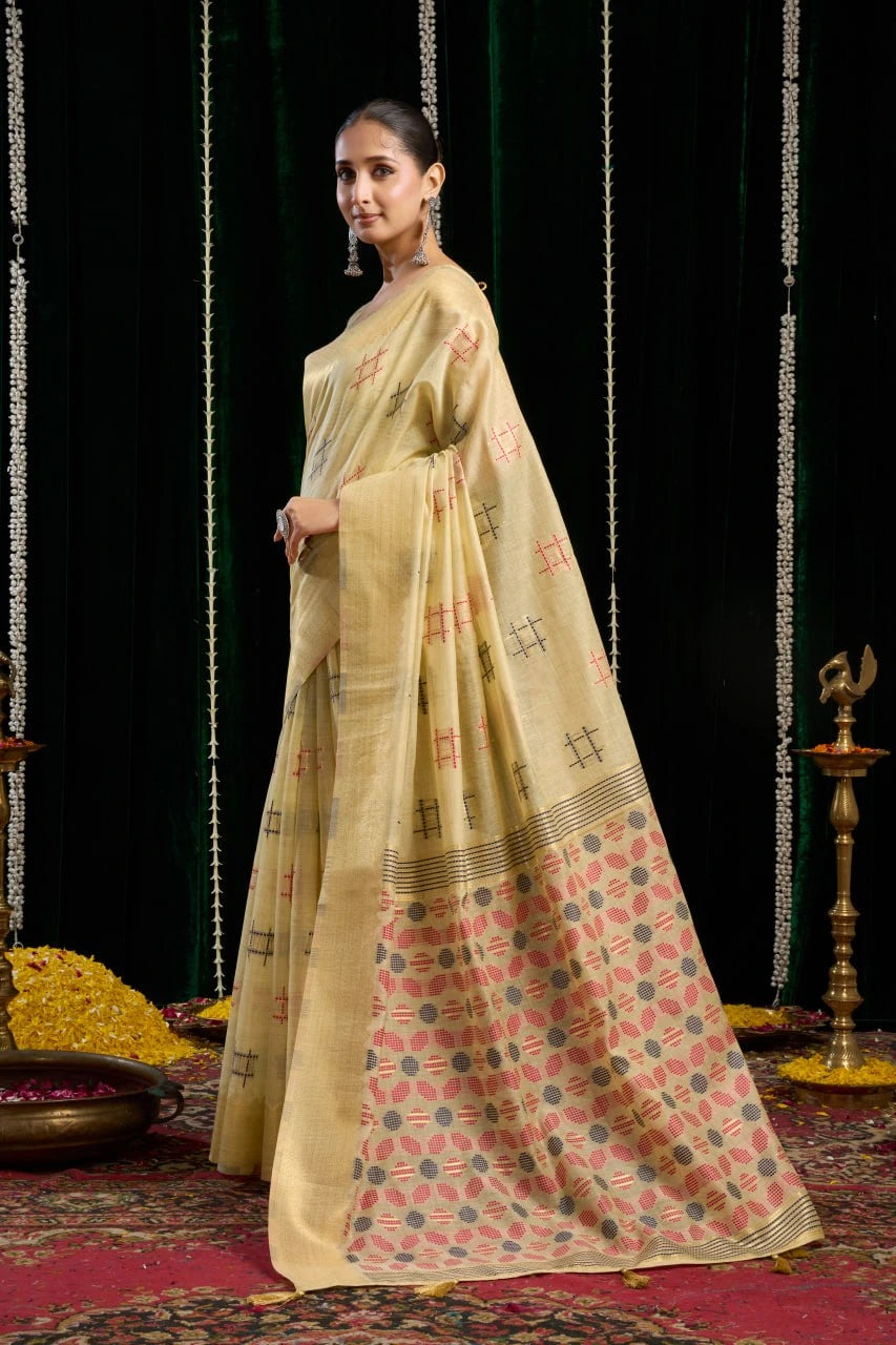 yellow soft spun cotton saree with a silver zari border