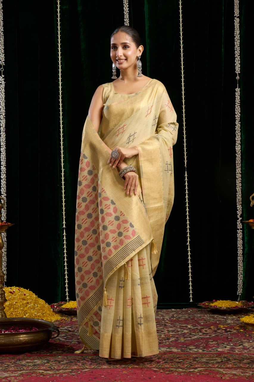 yellow soft spun cotton saree with a silver zari border
