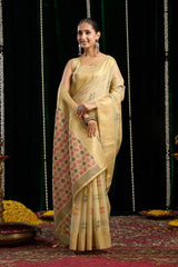 yellow soft spun cotton saree with a silver zari border