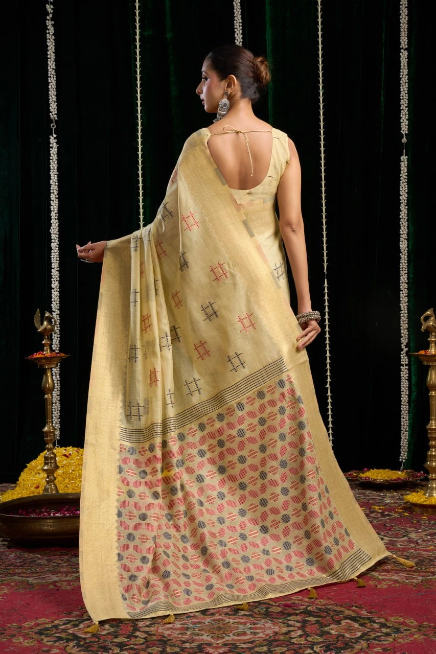 yellow soft spun cotton saree with a silver zari border