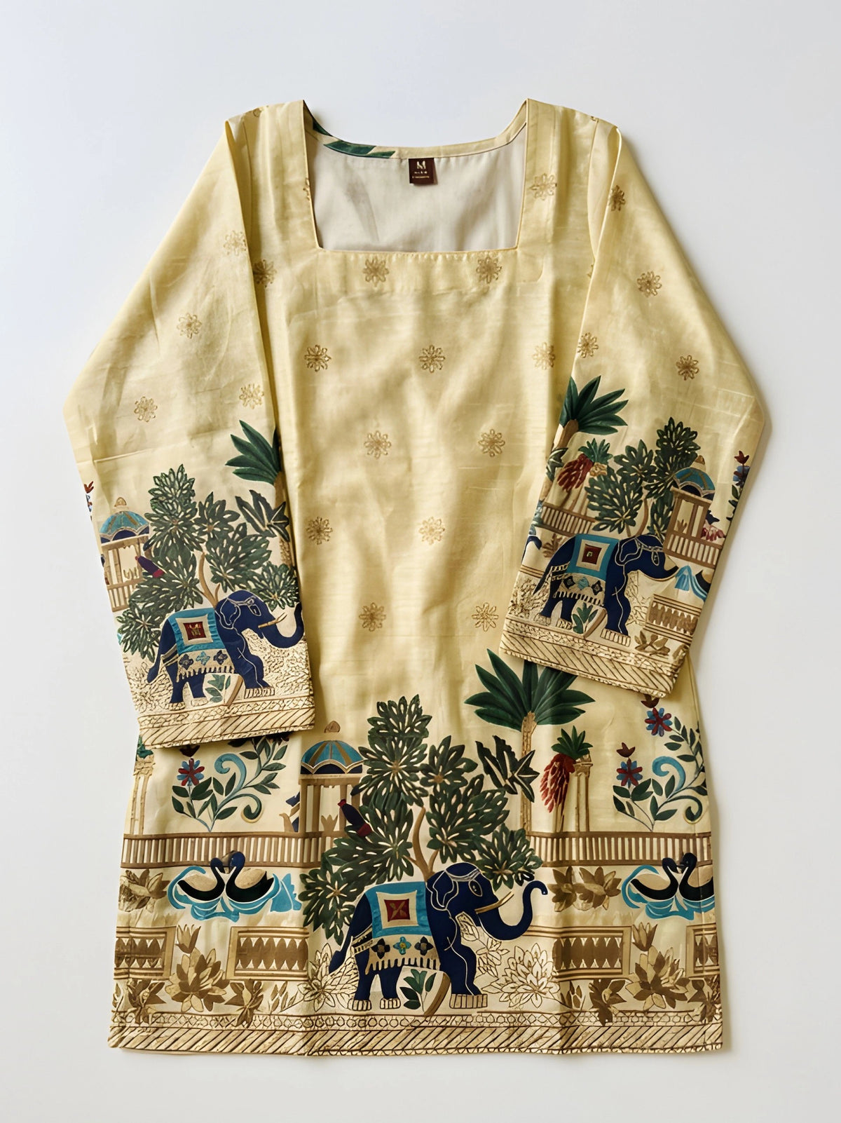 Flat lay of yellow Kalamkari print cotton short kurti with square neck showing full elephant, tree, and floral border print design