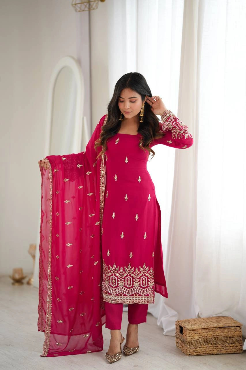 Pink Sequins Suit front view model looking down with embroidered booti dupatta