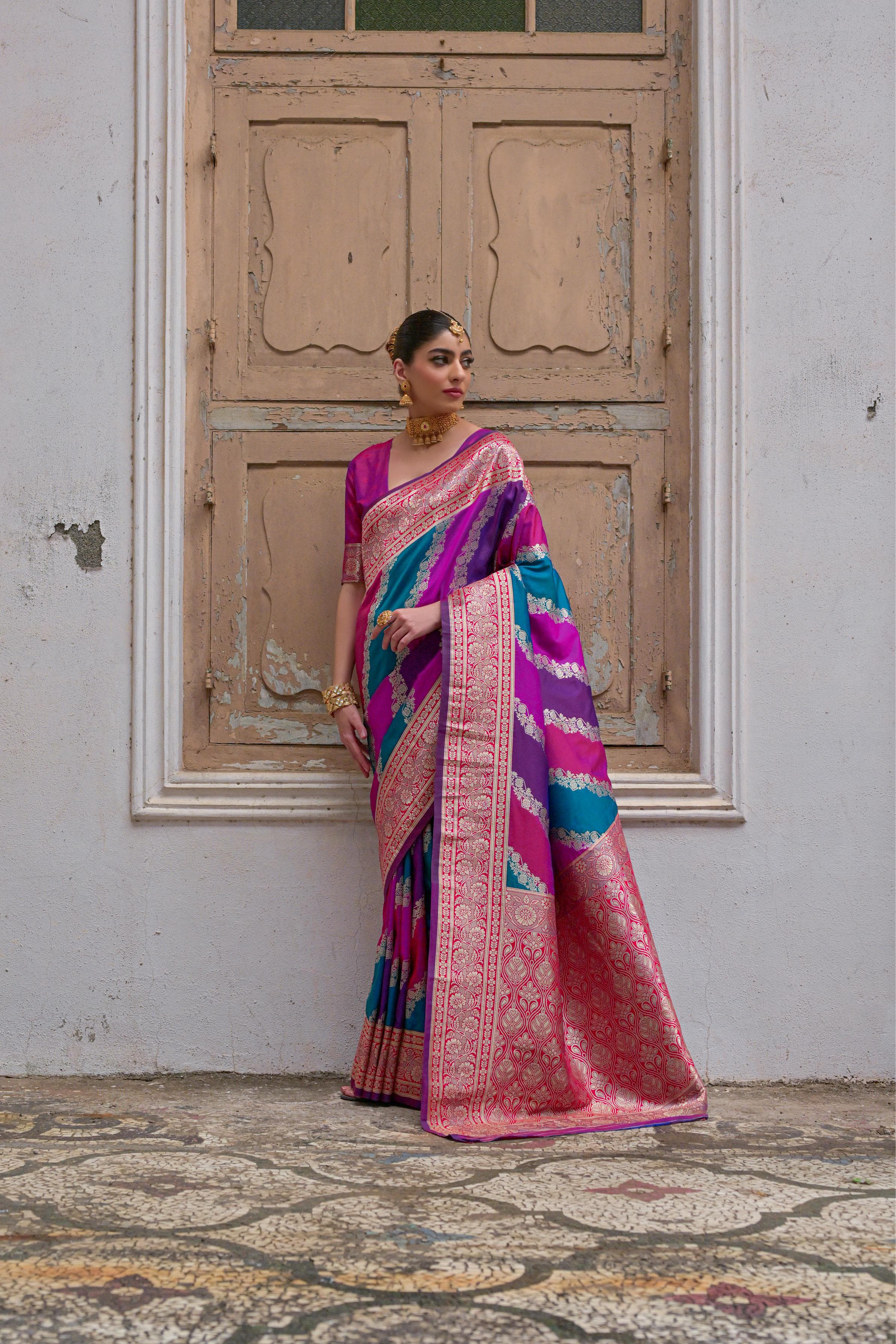 Pink saree with Kadwa style weaving and multicolor stripes Pink saree with Kadwa style weaving and multicolor stripes