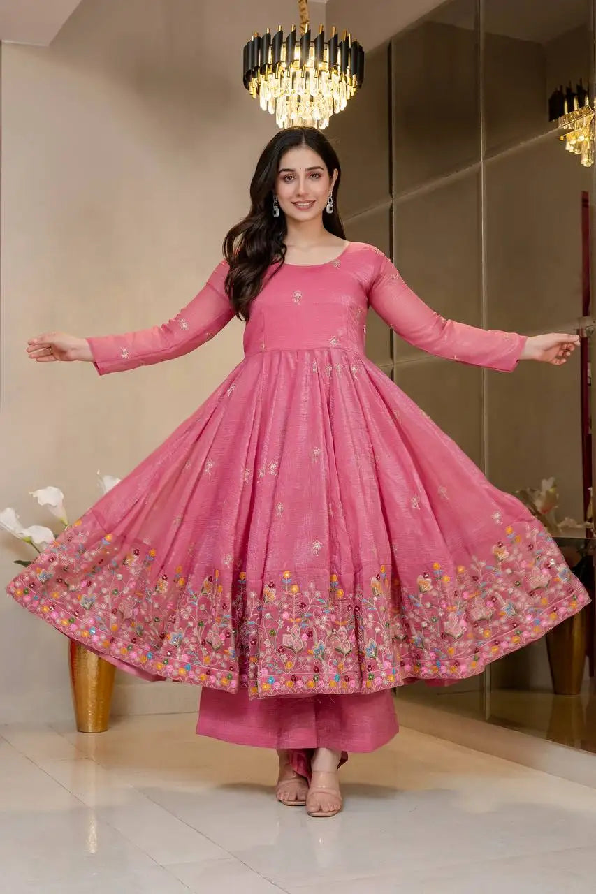 Pink Sequins Thread Suit KU255 model holding dupatta full sleeve