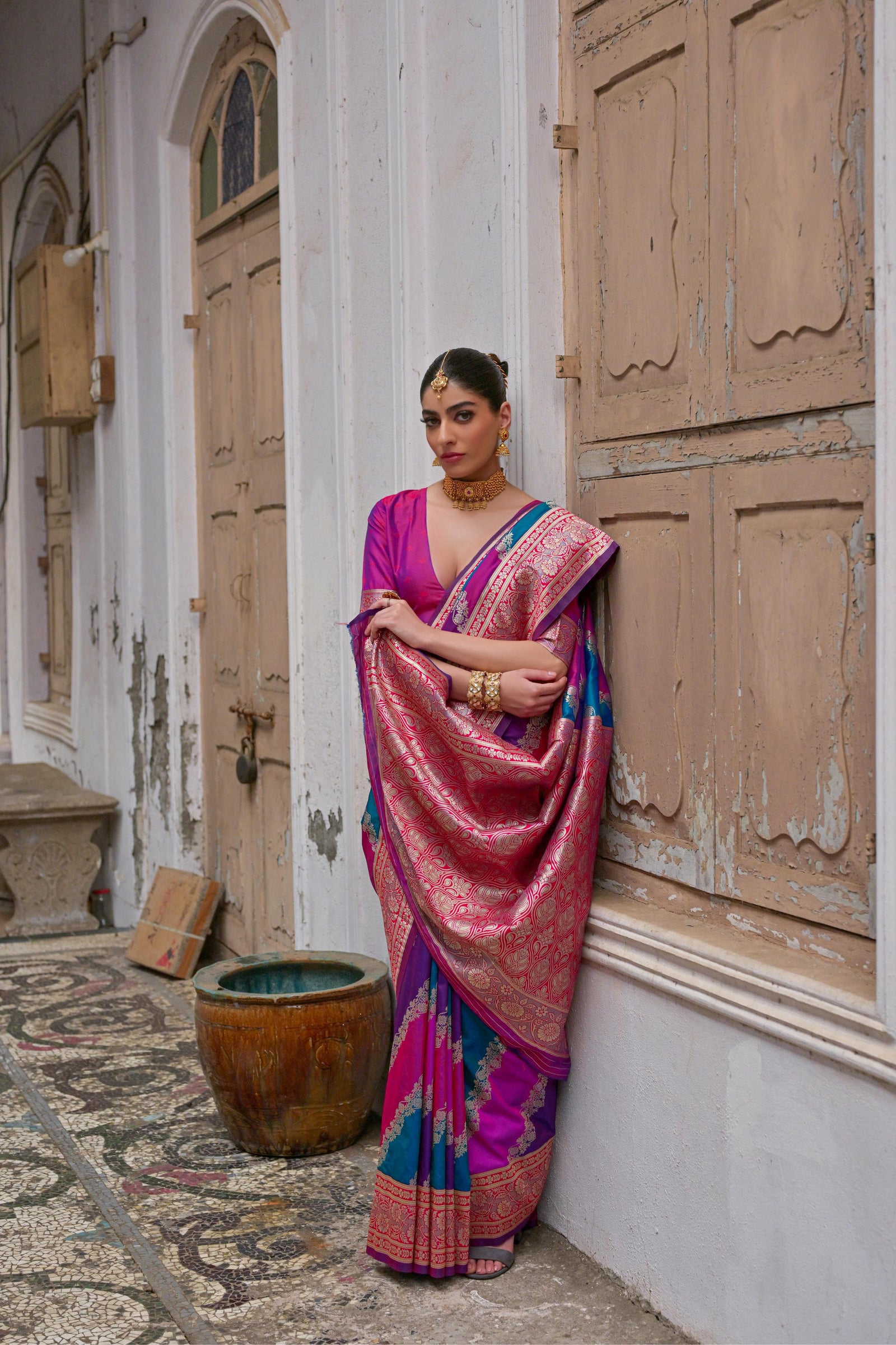 Pink saree with Kadwa style weaving and multicolor stripes